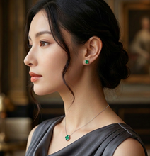Load image into Gallery viewer, Emerald Stud Earrings set in 14K White Gold
