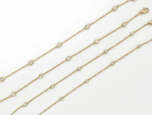 Load image into Gallery viewer, Diamonds by the Yard Bracelet With 5 Bezel Round Brilliant Diamonds set in 14K Yellow Gold
