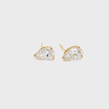 Load and play video in Gallery viewer, 2 Carat Pear-Shaped Lab Grown Diamond Earrings set in 14K Yellow Gold

